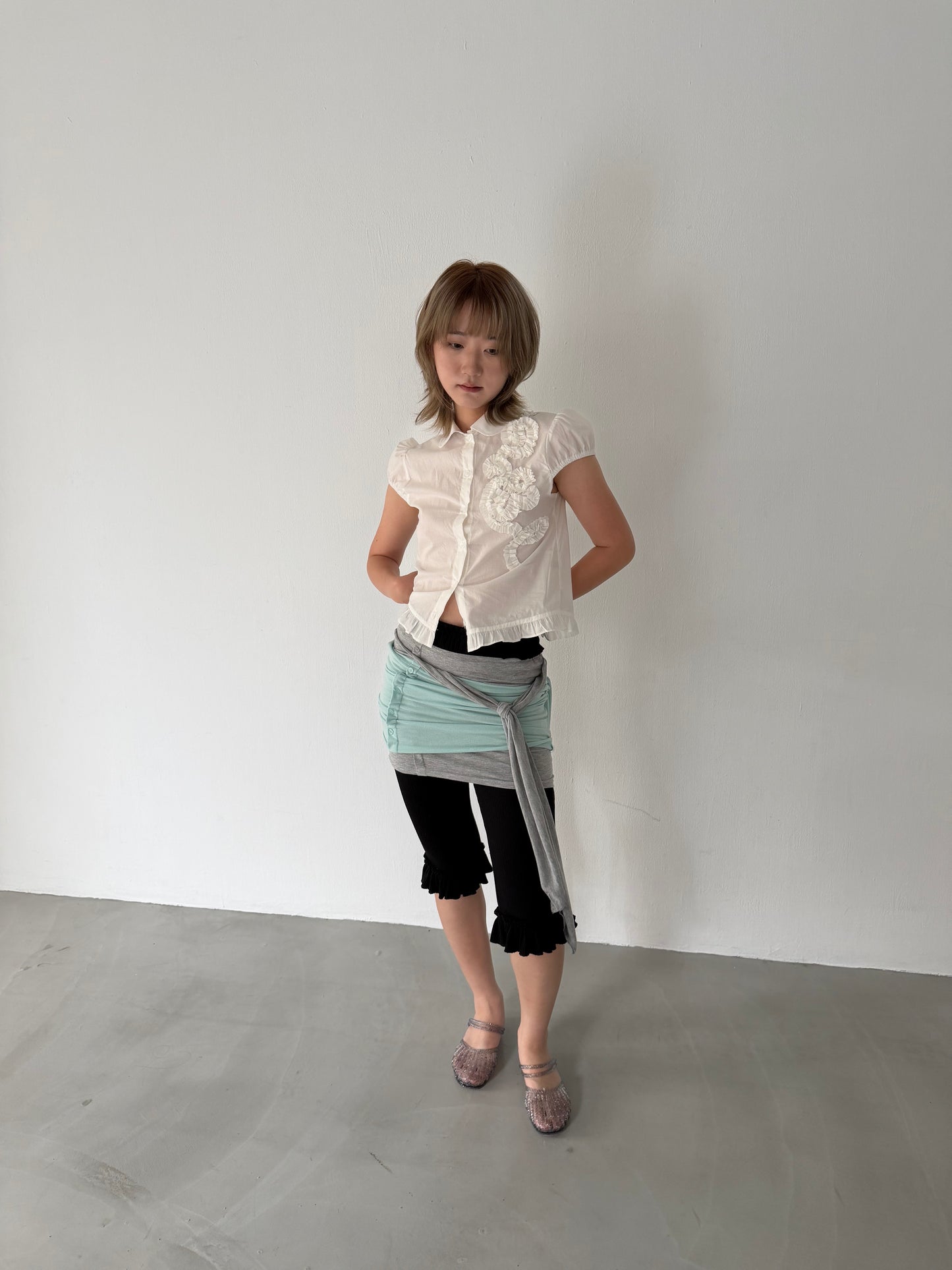 Lace-trimmed flutter sleeve shirt