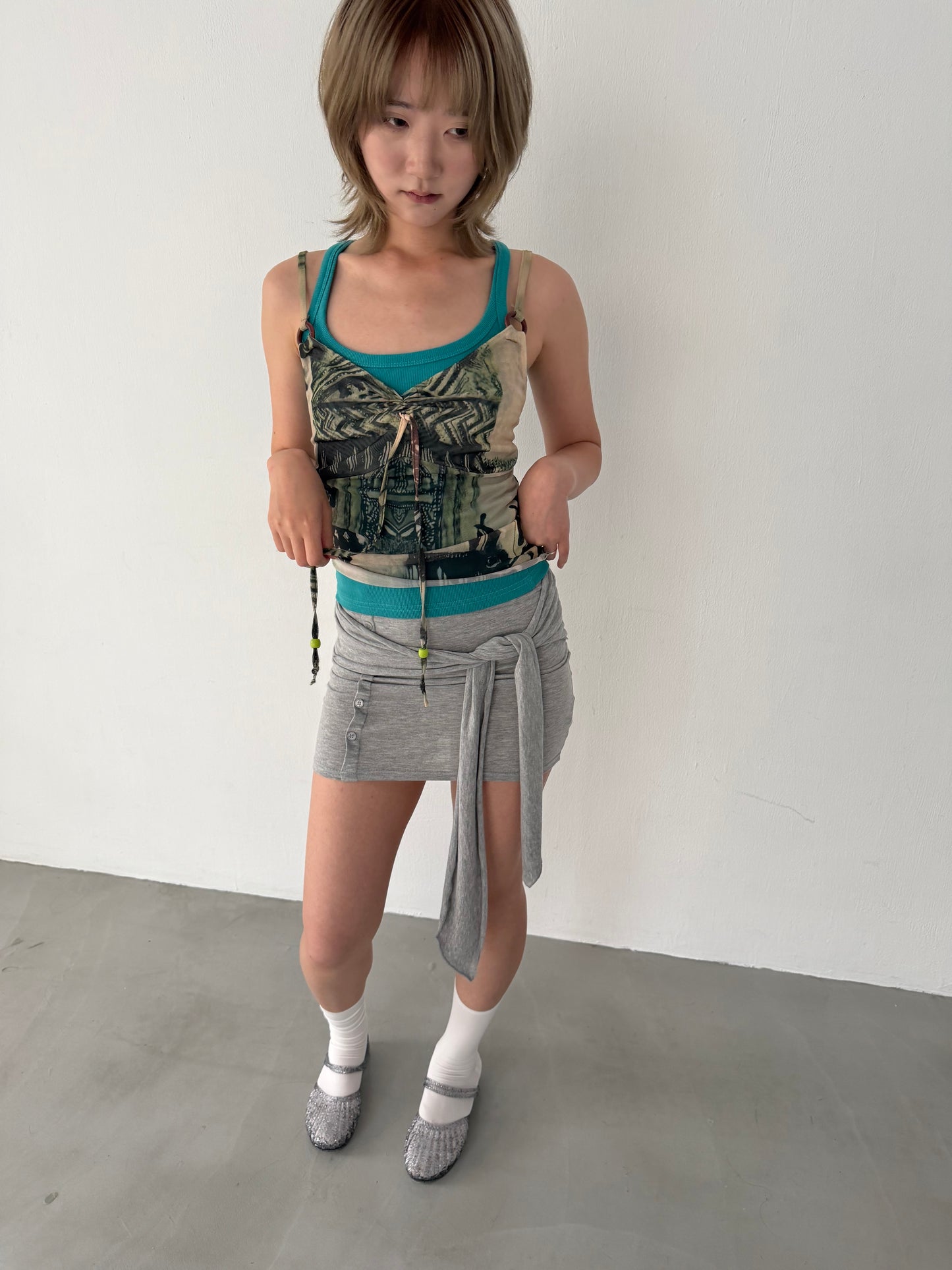 Sheer graphic buckle vest