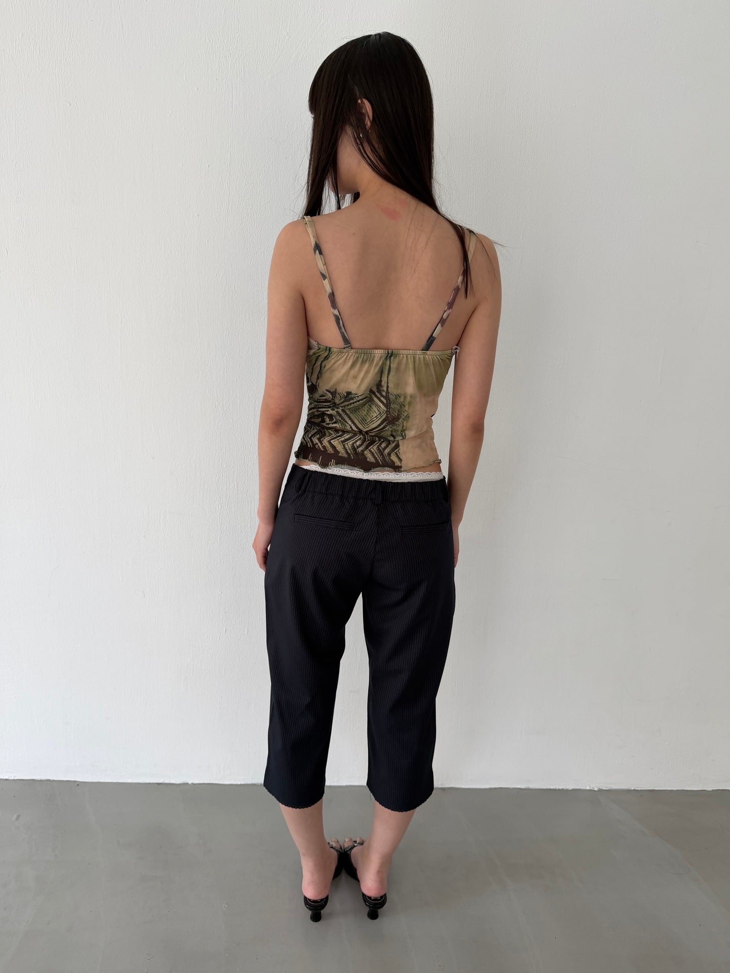 Sheer graphic buckle vest