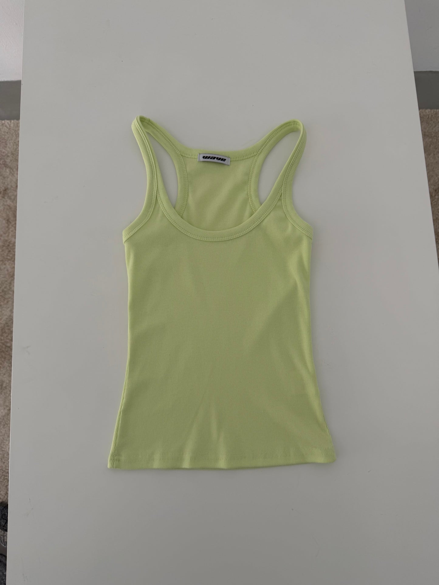 Brightly colored spaghetti strap tank top