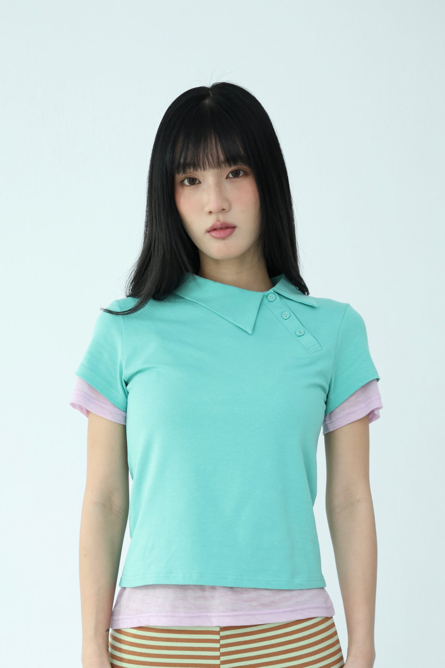 Candy-colored diagonal button polo shirt