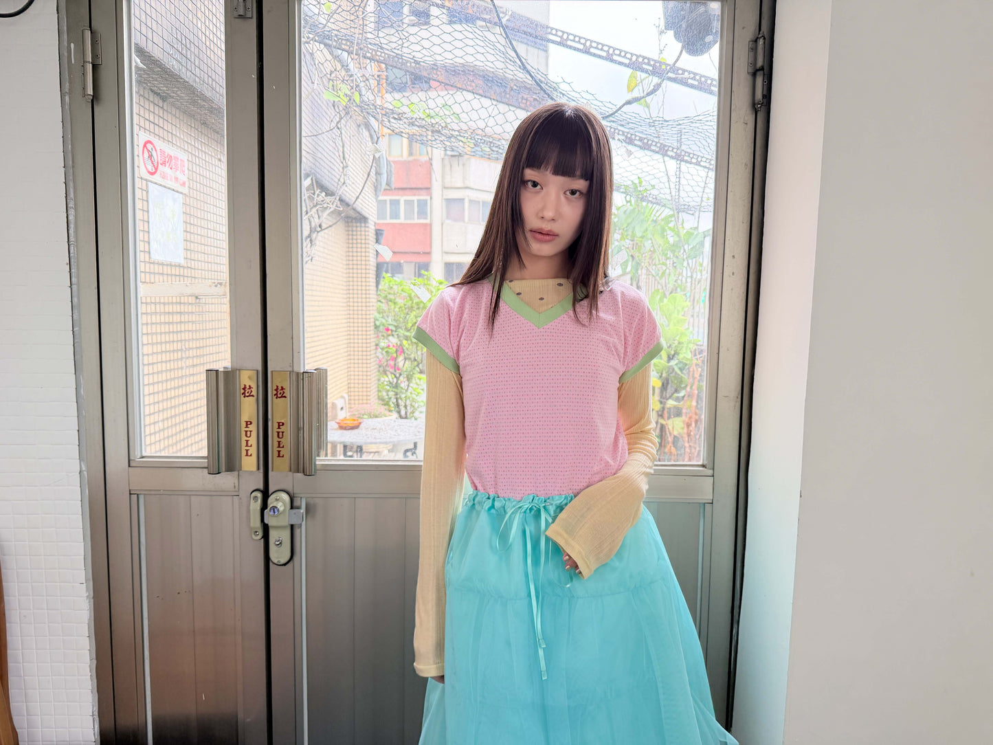 Candy-colored short-sleeved V-neck top