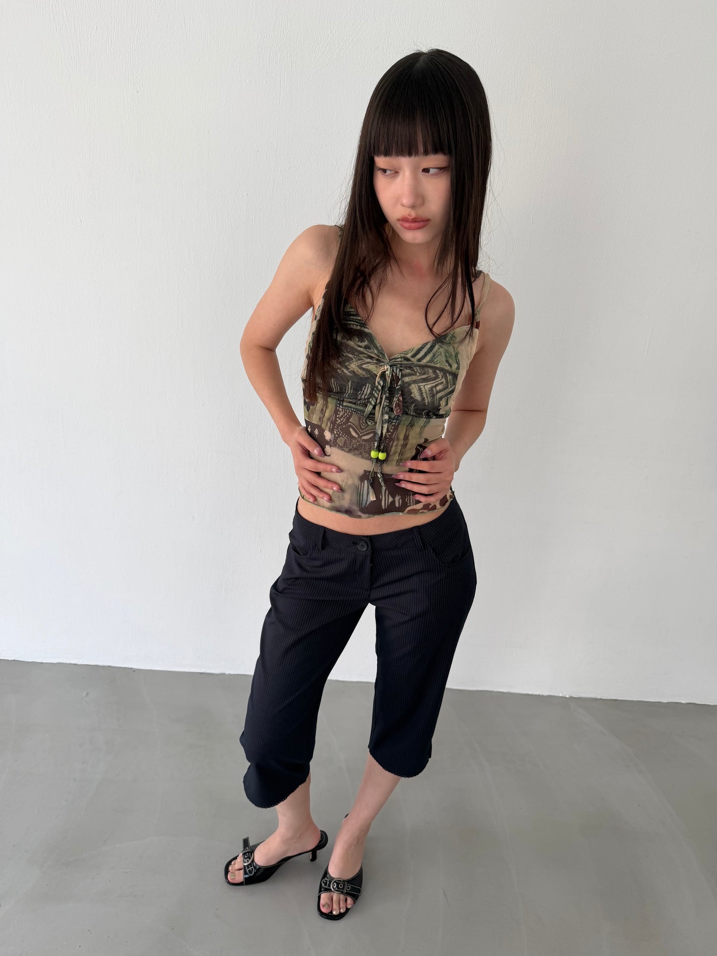 Sheer graphic buckle vest