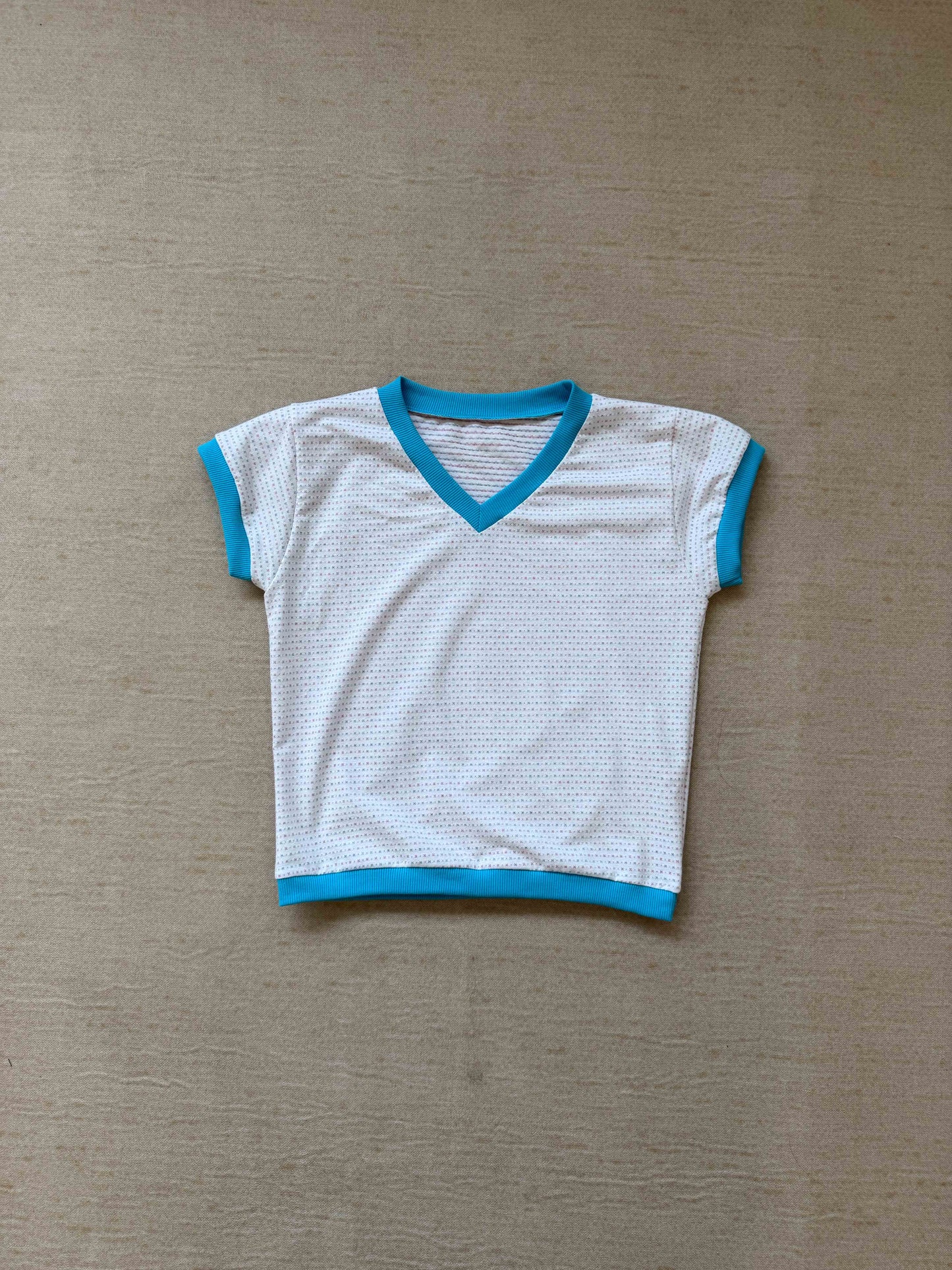 Candy-colored short-sleeved V-neck top
