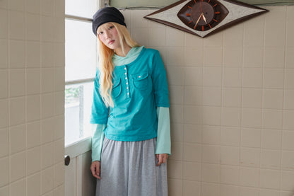 Rolled-up patchwork hooded top