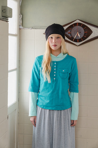 Rolled-up patchwork hooded top