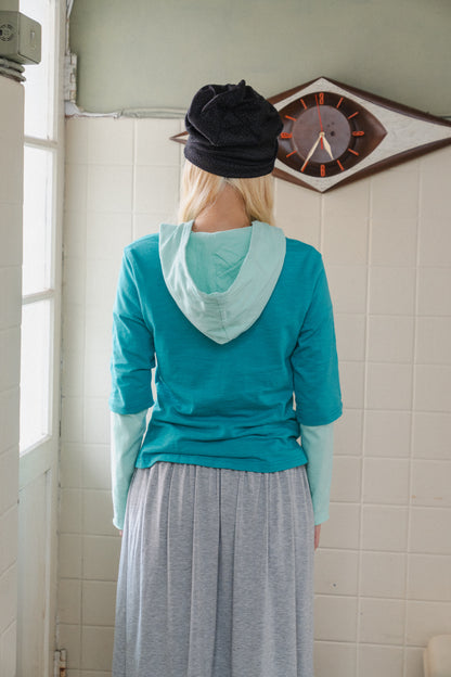 Rolled-up patchwork hooded top