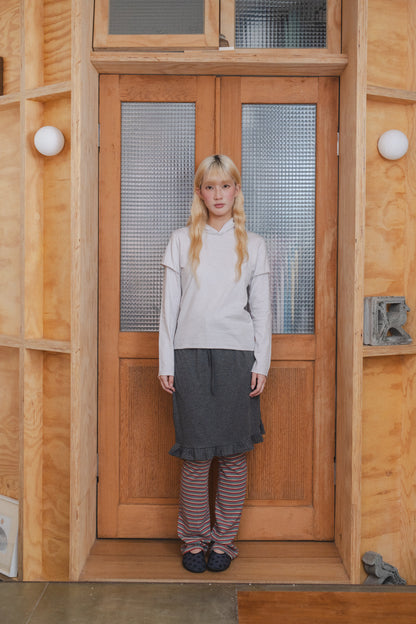 Rolled-up patchwork hooded top