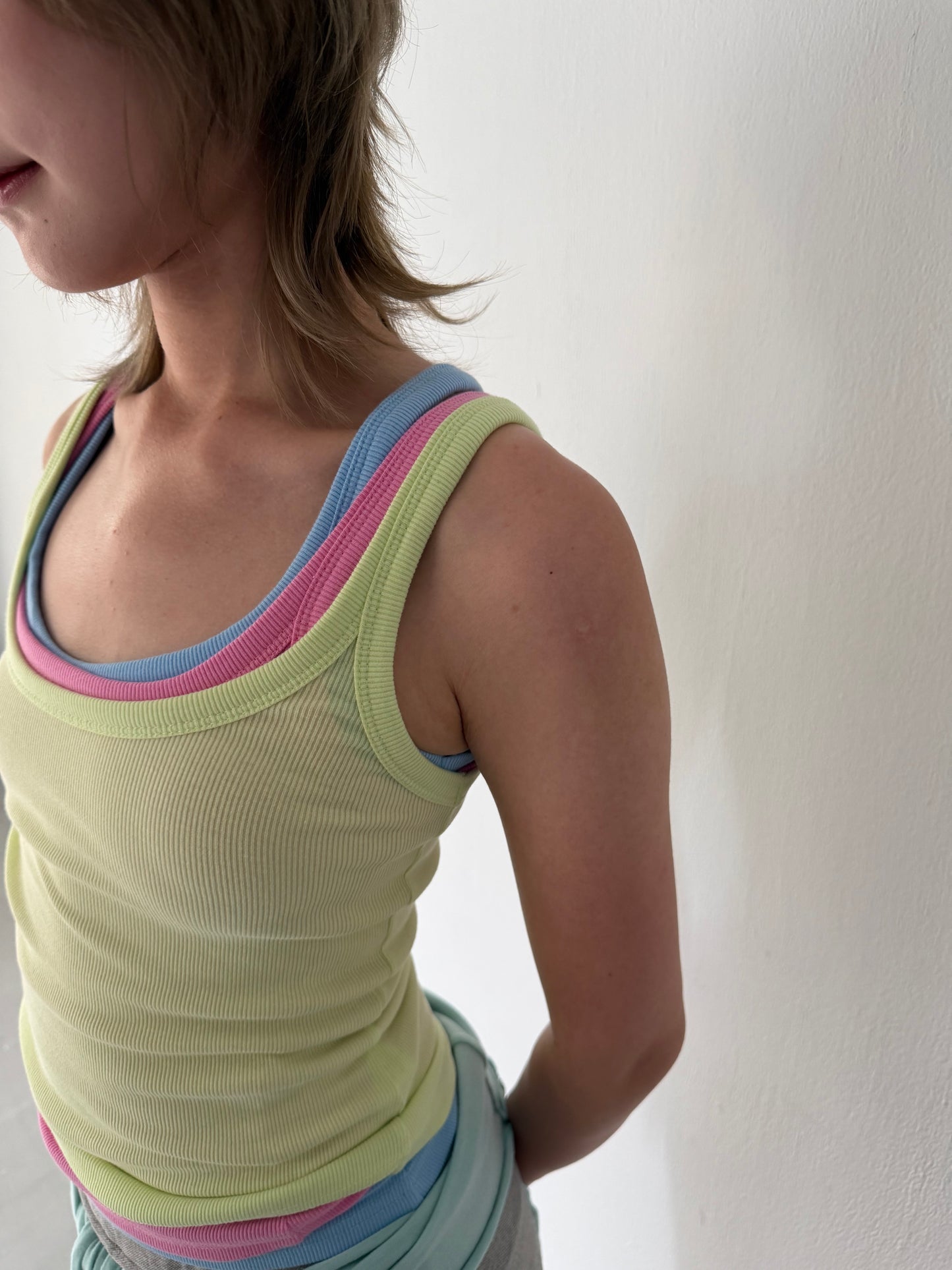 Brightly colored spaghetti strap tank top