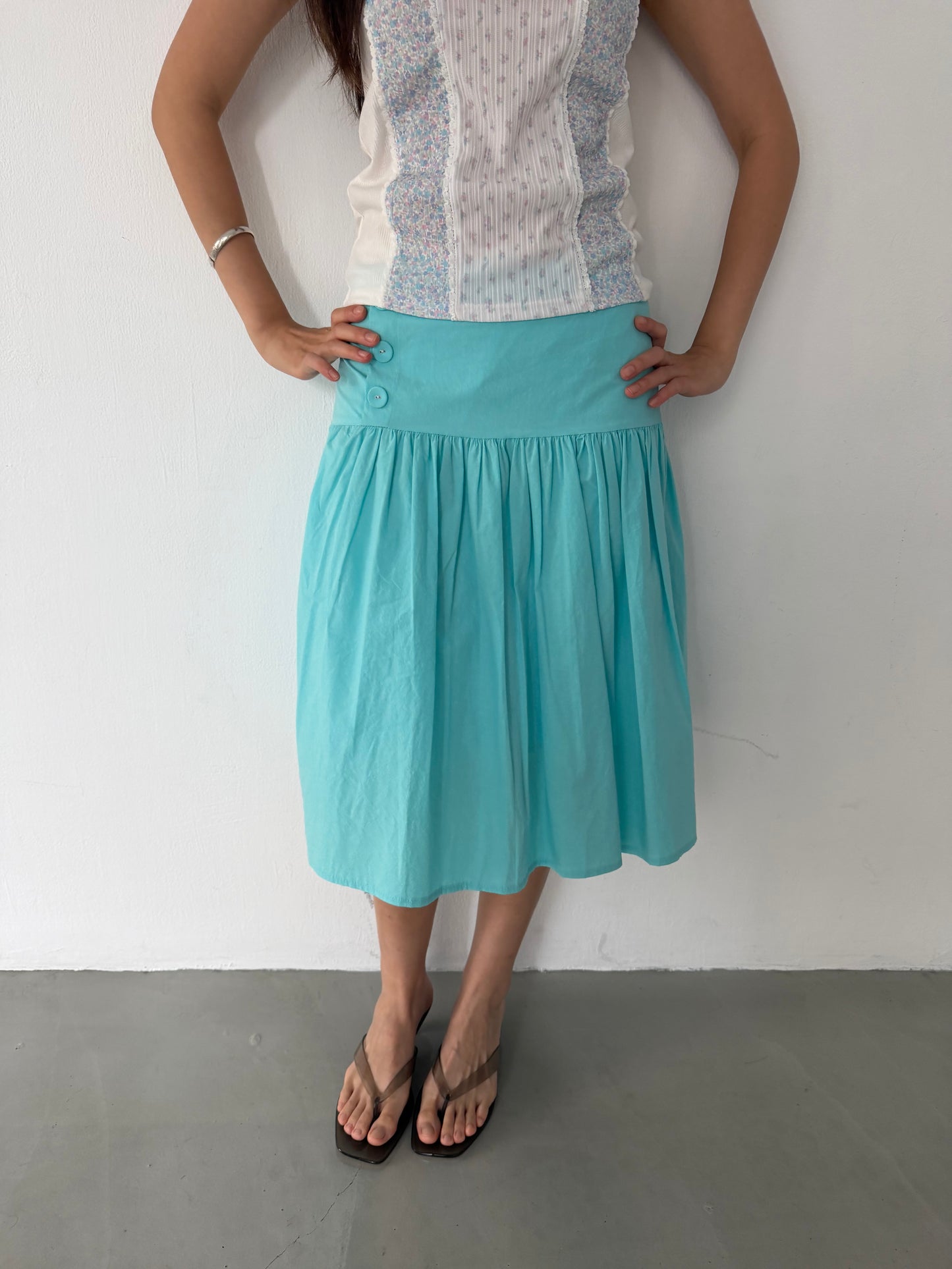Side-button midi skirt