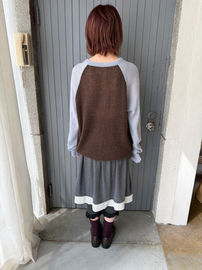 Henley collar knit raglan top