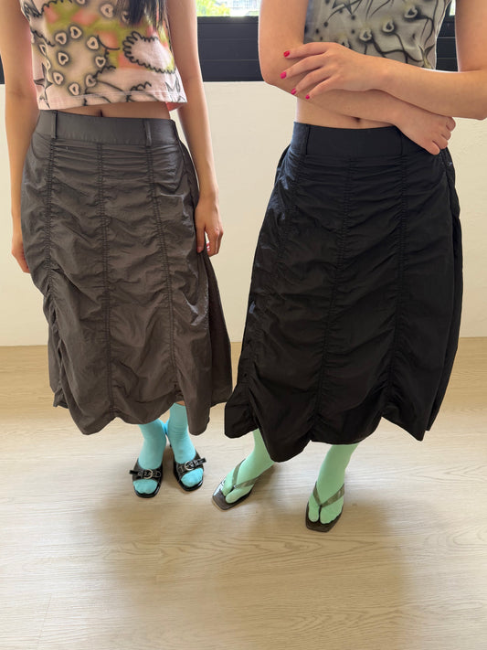 Nylon glossy pleated midi skirt