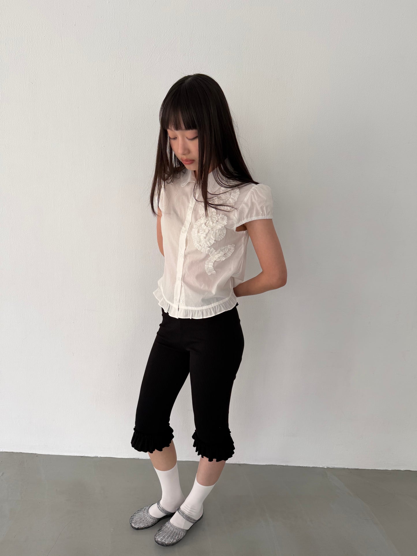 Lace-trimmed flutter sleeve shirt