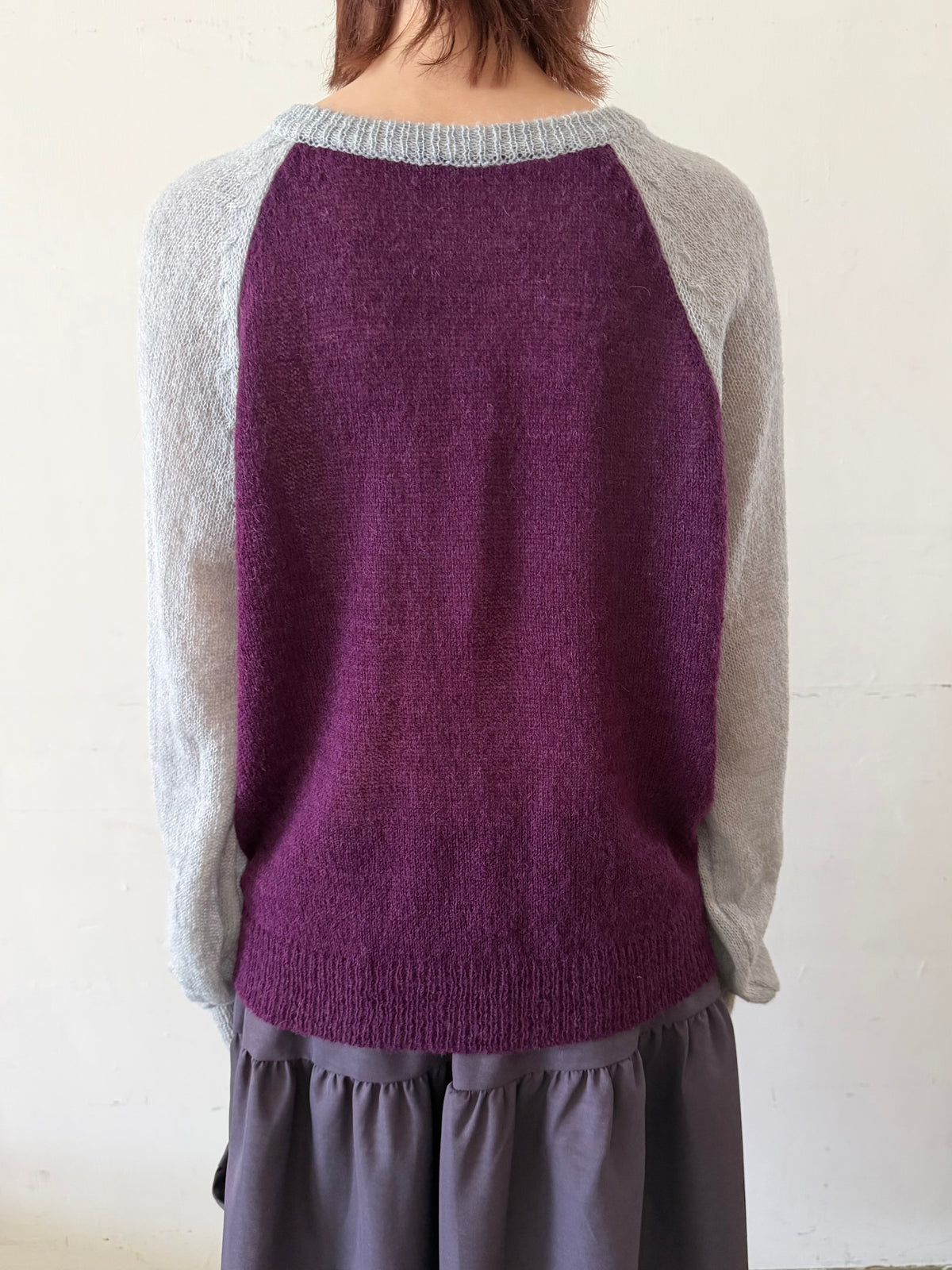 Henley collar knit raglan top