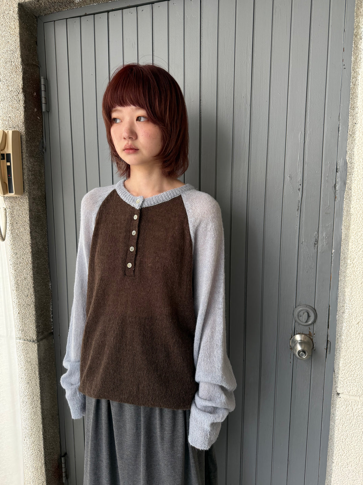 Henley collar knit raglan top