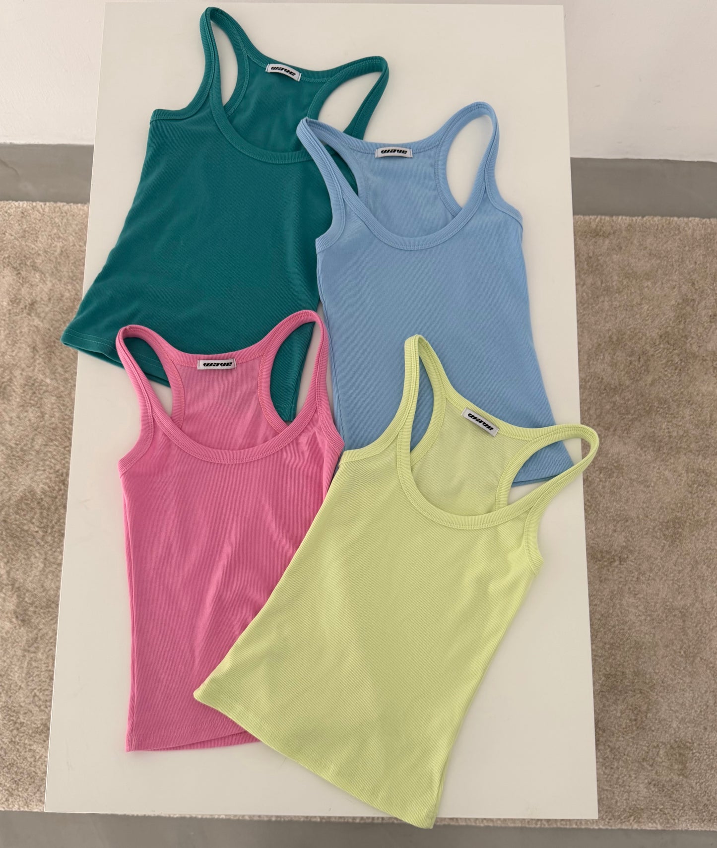 Brightly colored spaghetti strap tank top