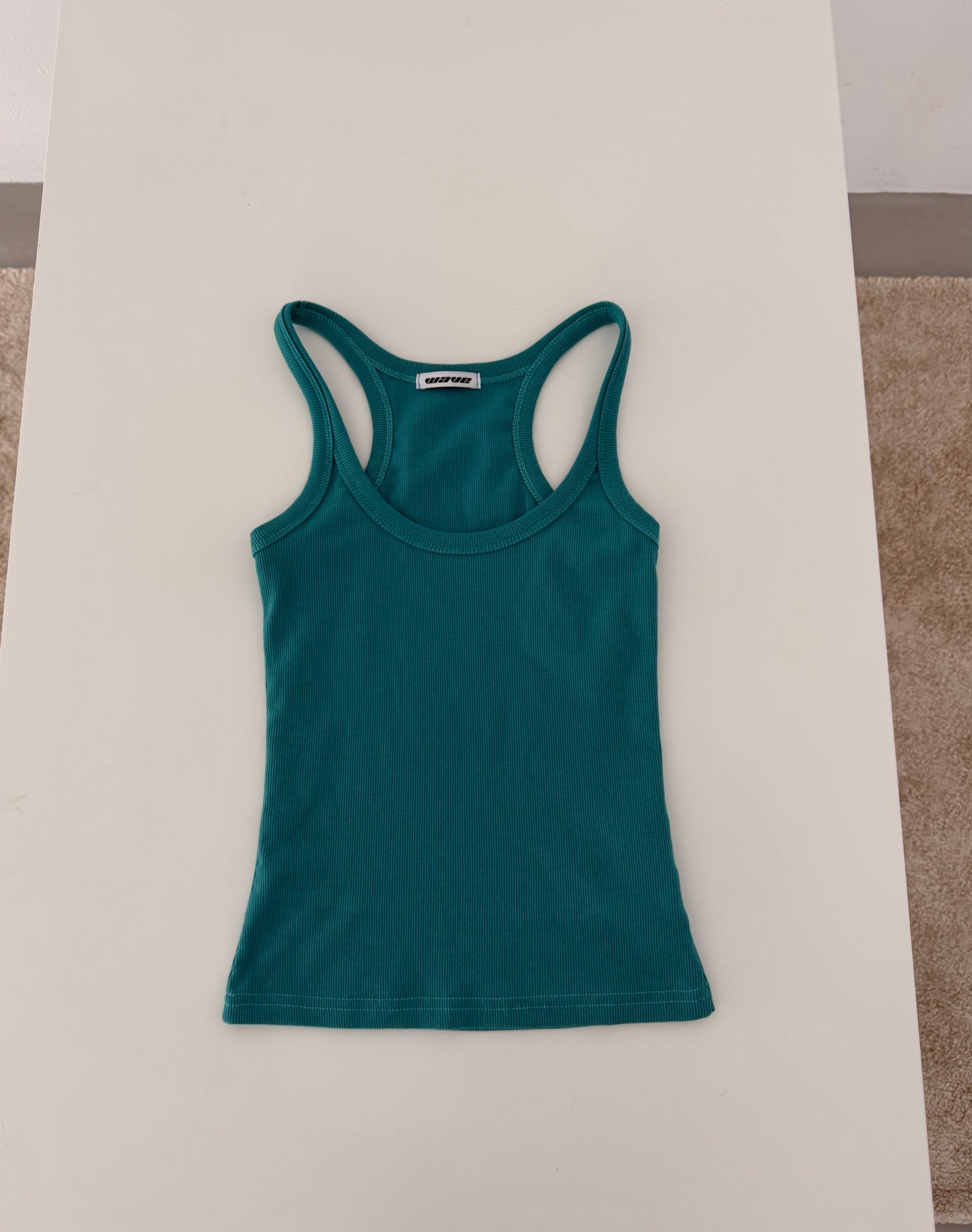 Brightly colored spaghetti strap tank top