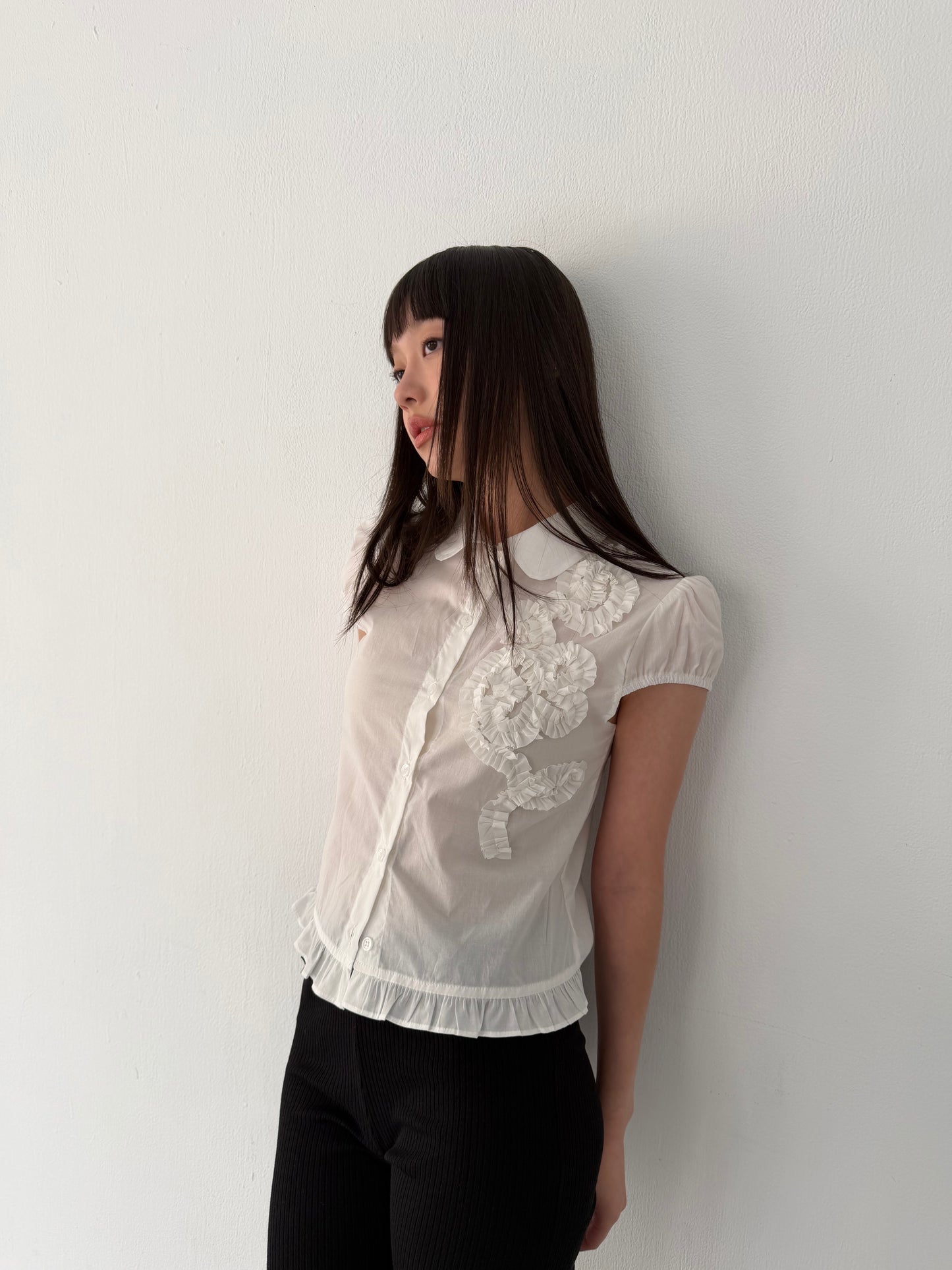 Lace-trimmed flutter sleeve shirt
