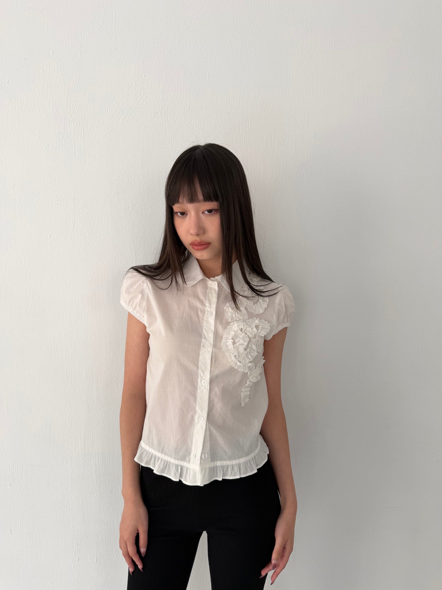 Lace-trimmed flutter sleeve shirt