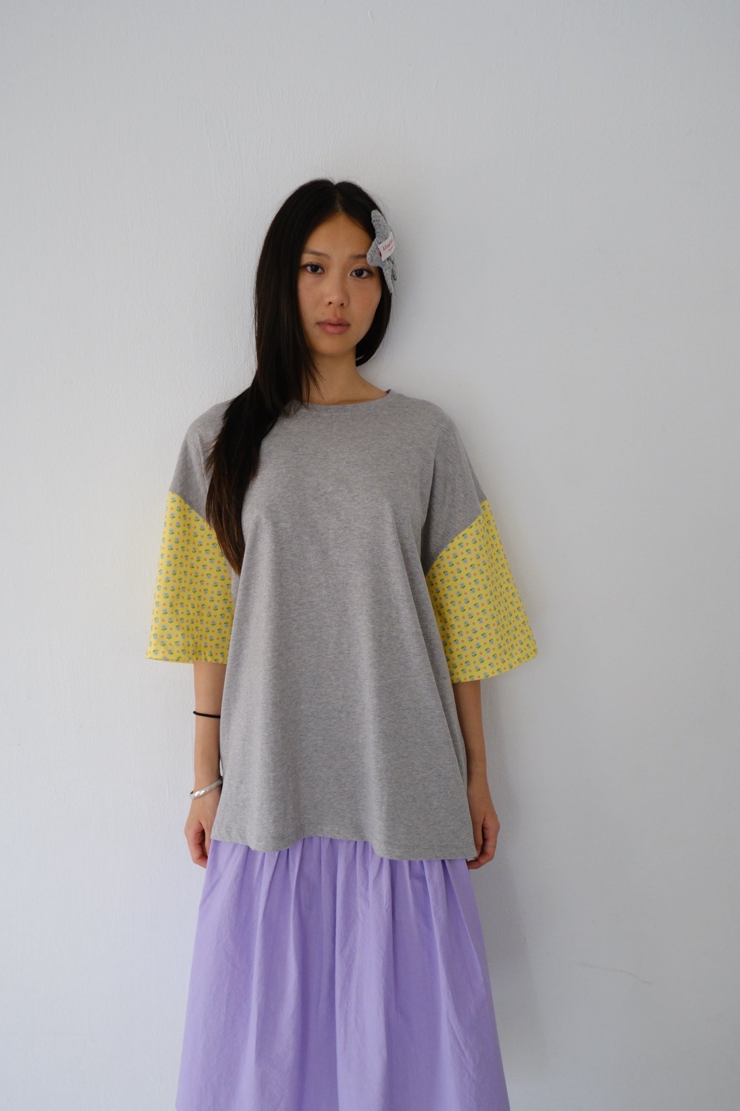 Loose-fitting floral patchwork sleeve top