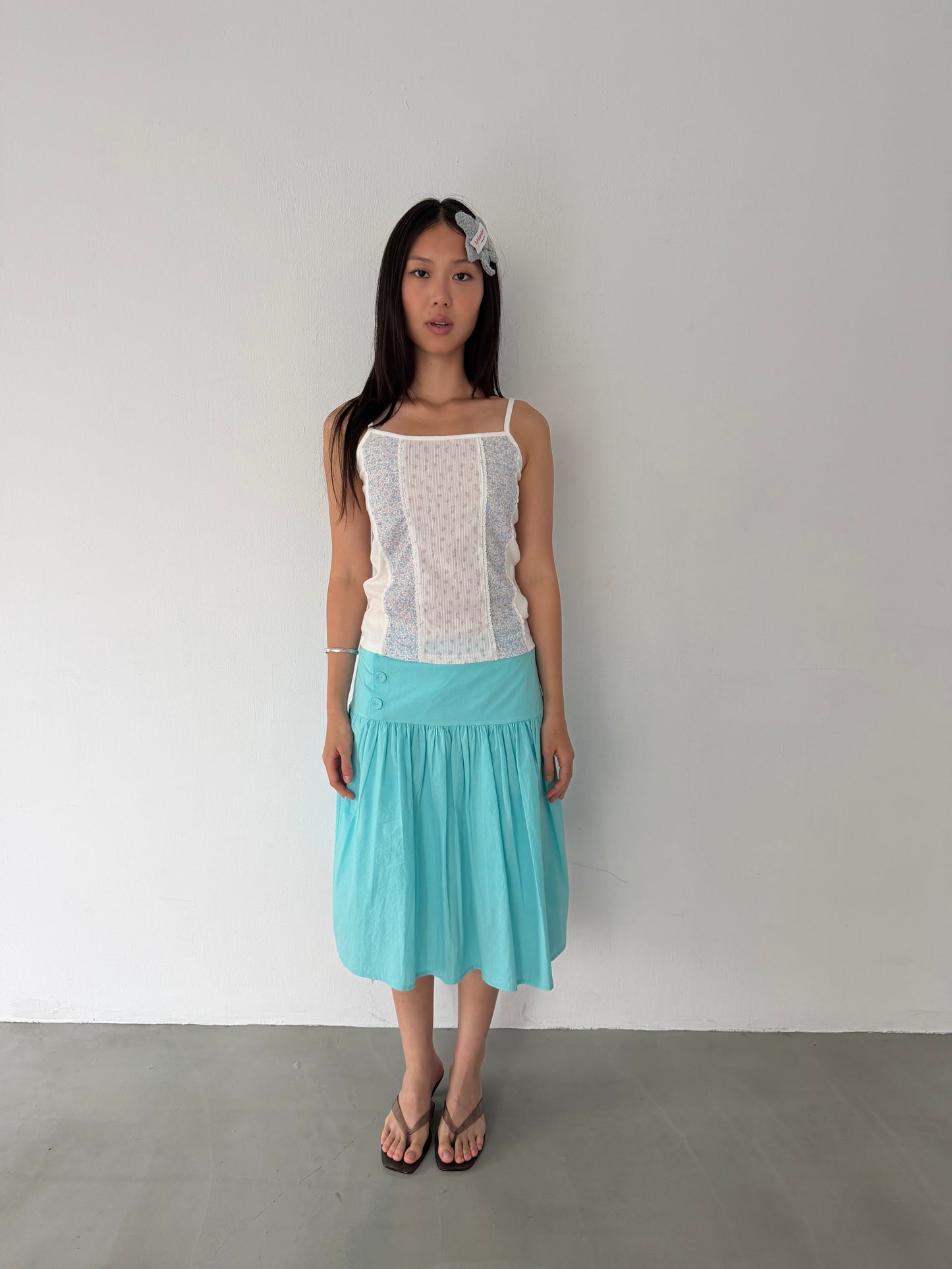 Side-button midi skirt