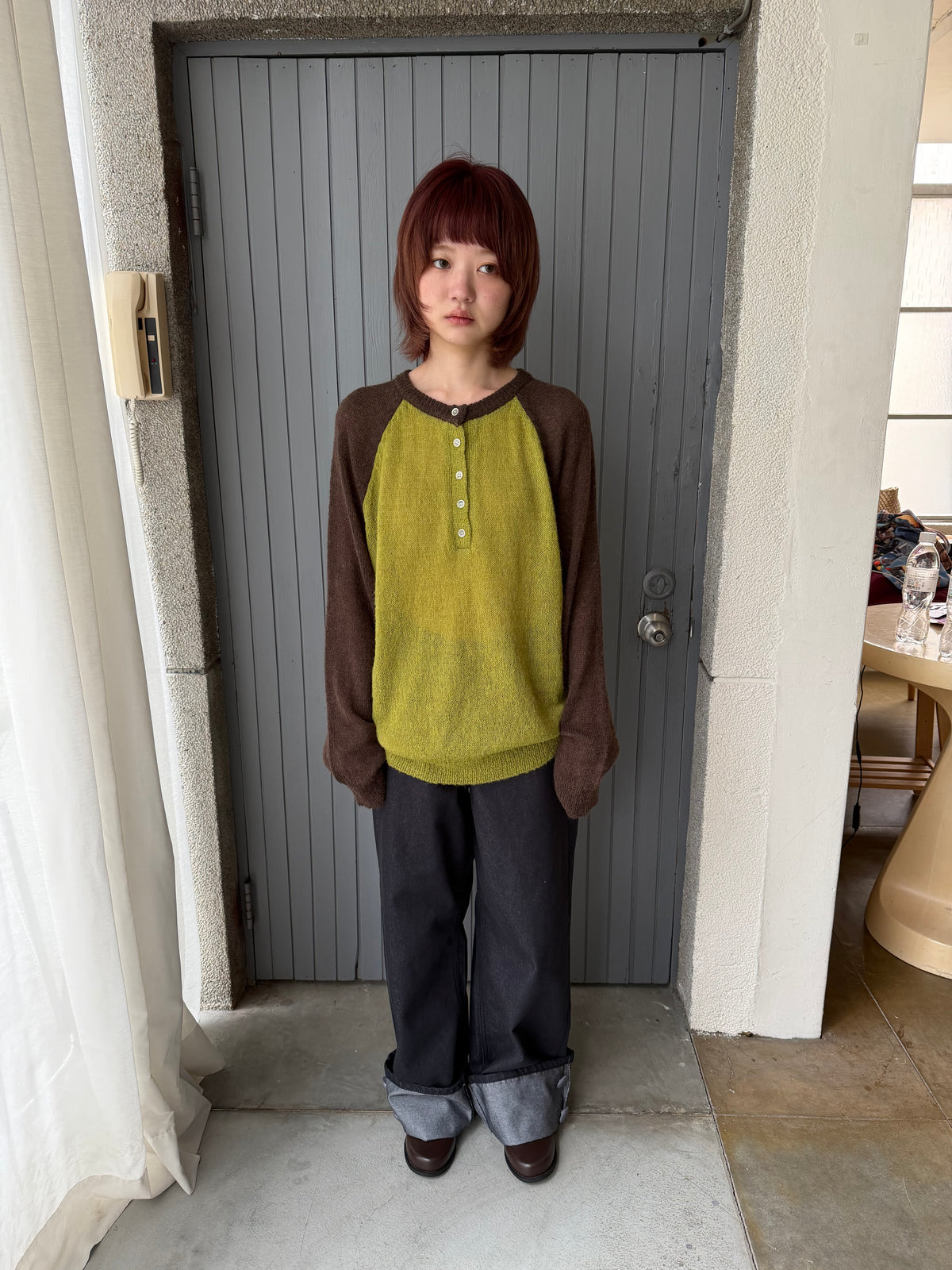 Henley collar knit raglan top