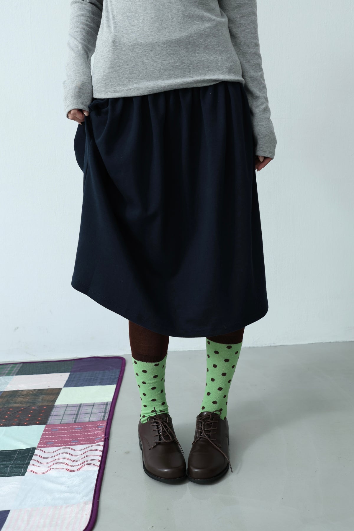Elastic button midi skirt