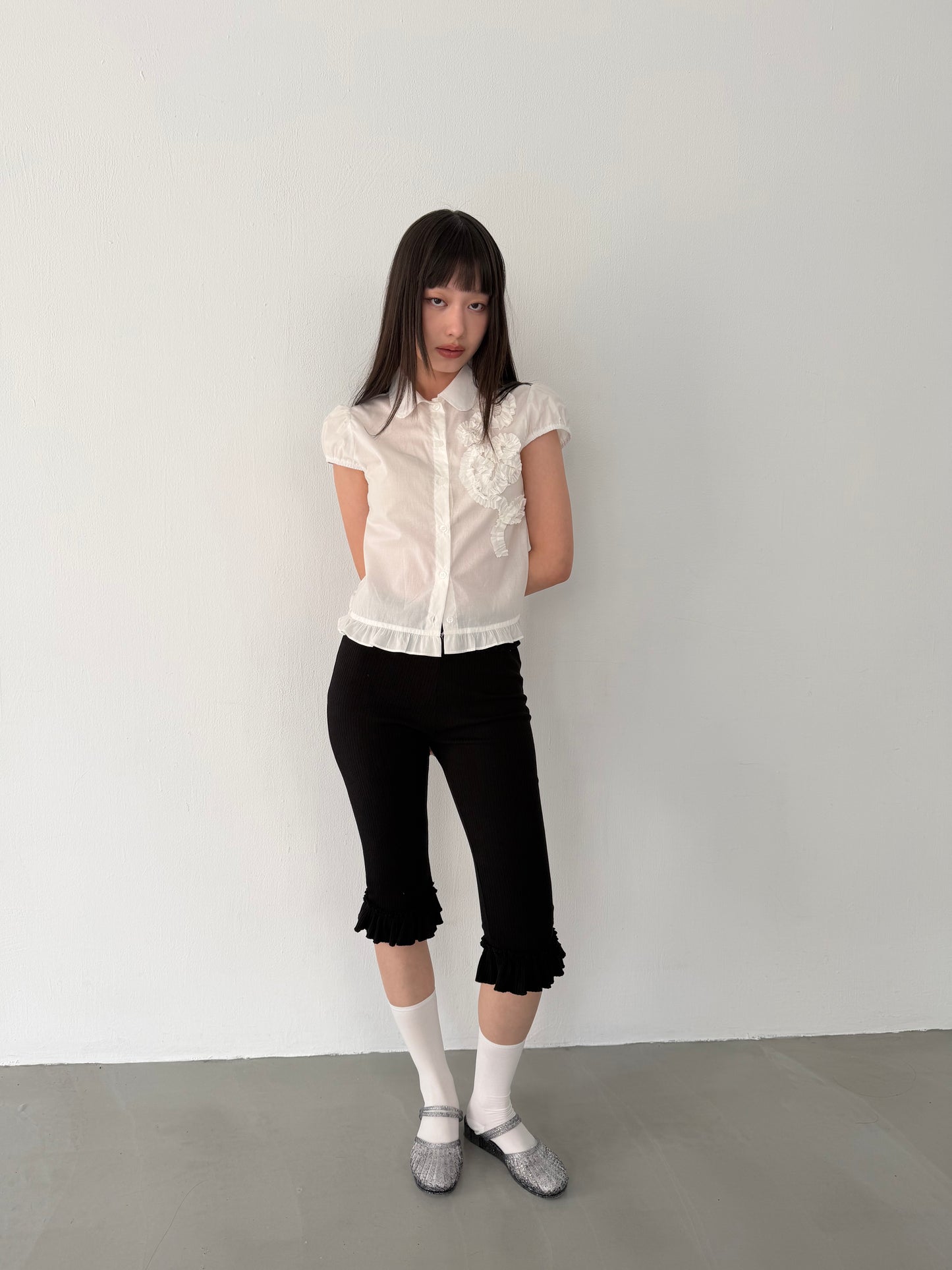 Lace-trimmed flutter sleeve shirt