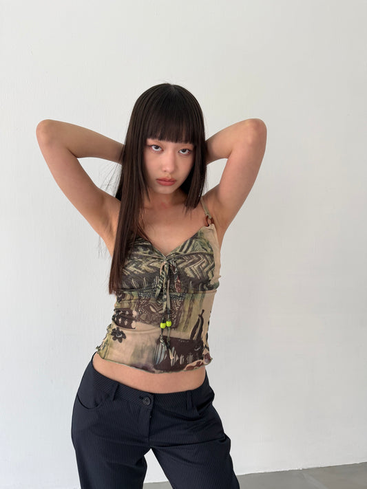 Sheer graphic buckle vest