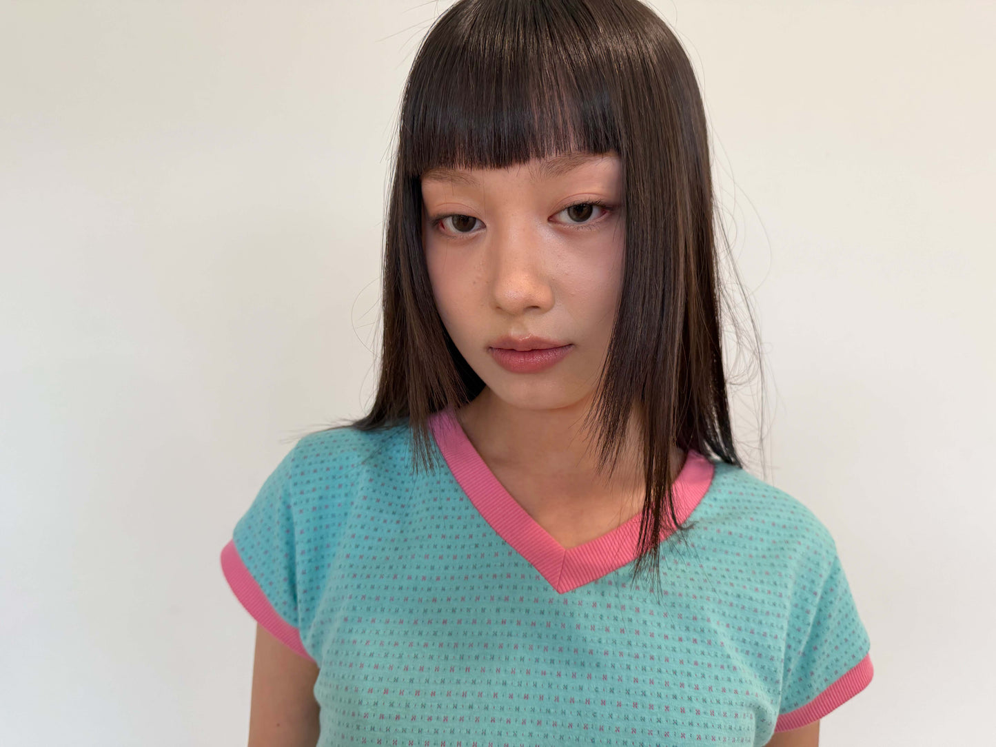 Candy-colored short-sleeved V-neck top
