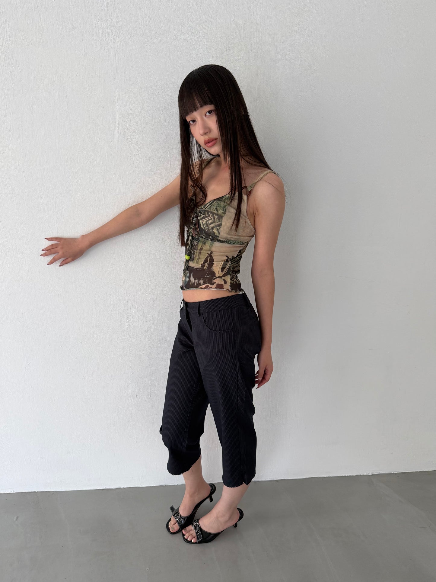 Sheer graphic buckle vest