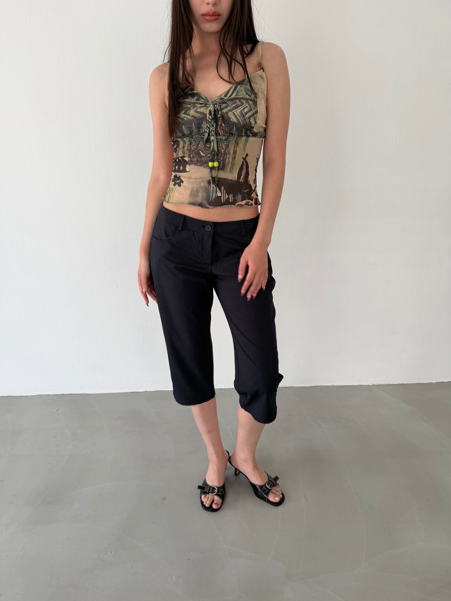 Sheer graphic buckle vest