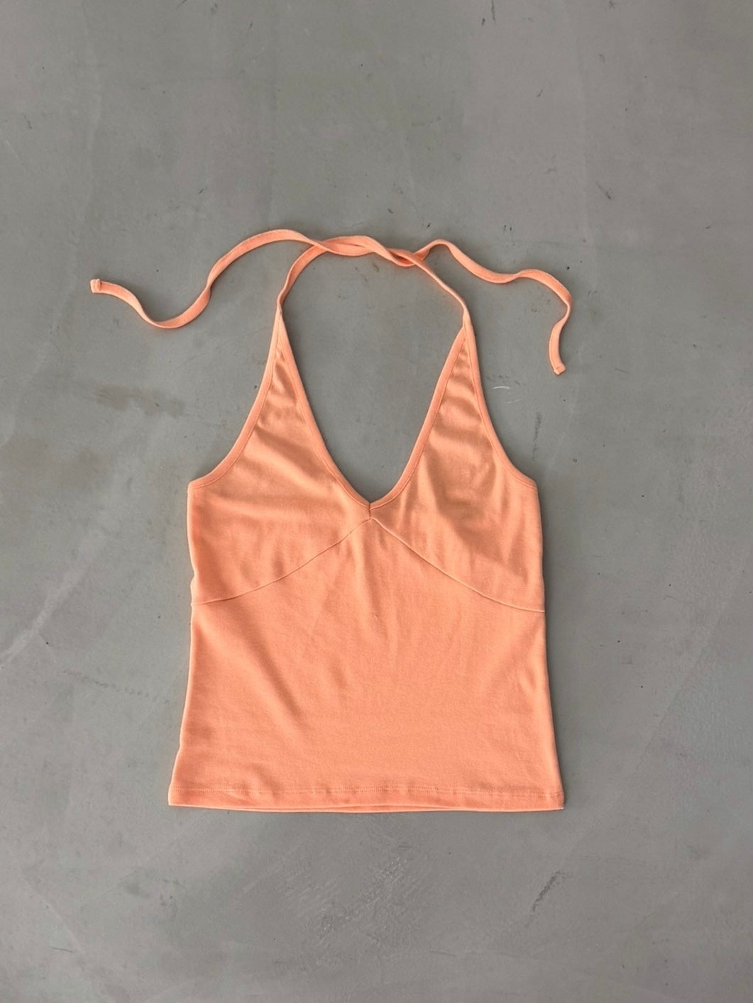 Brightly colored halter neck vest