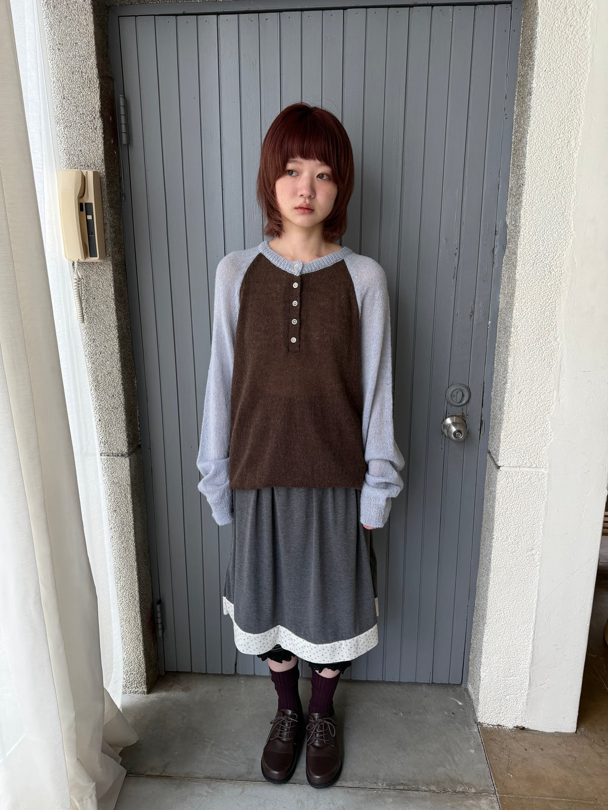 Henley collar knit raglan top