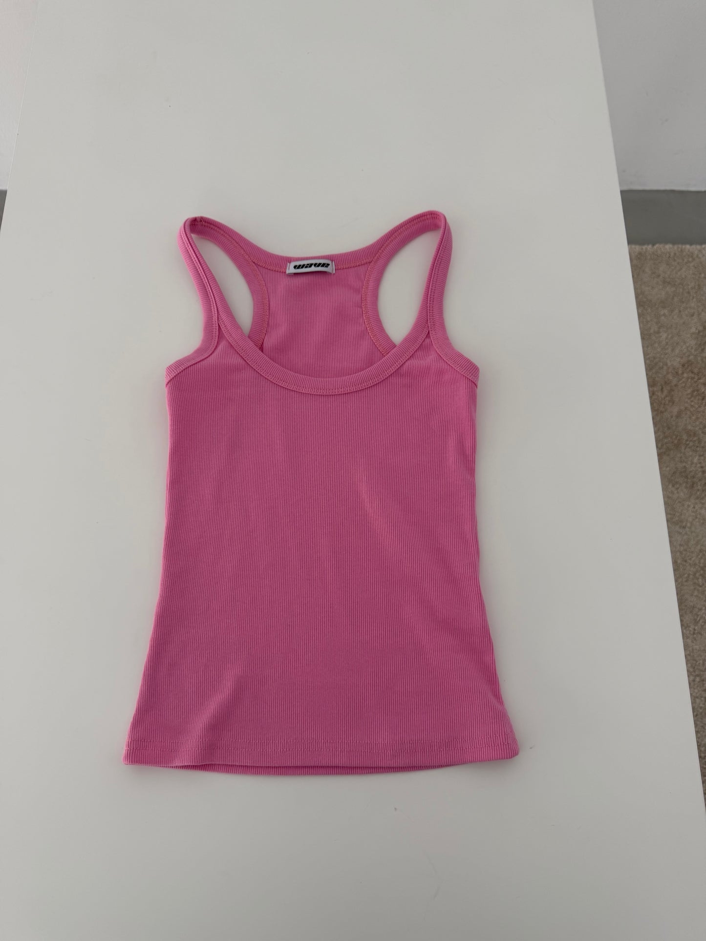 Brightly colored spaghetti strap tank top