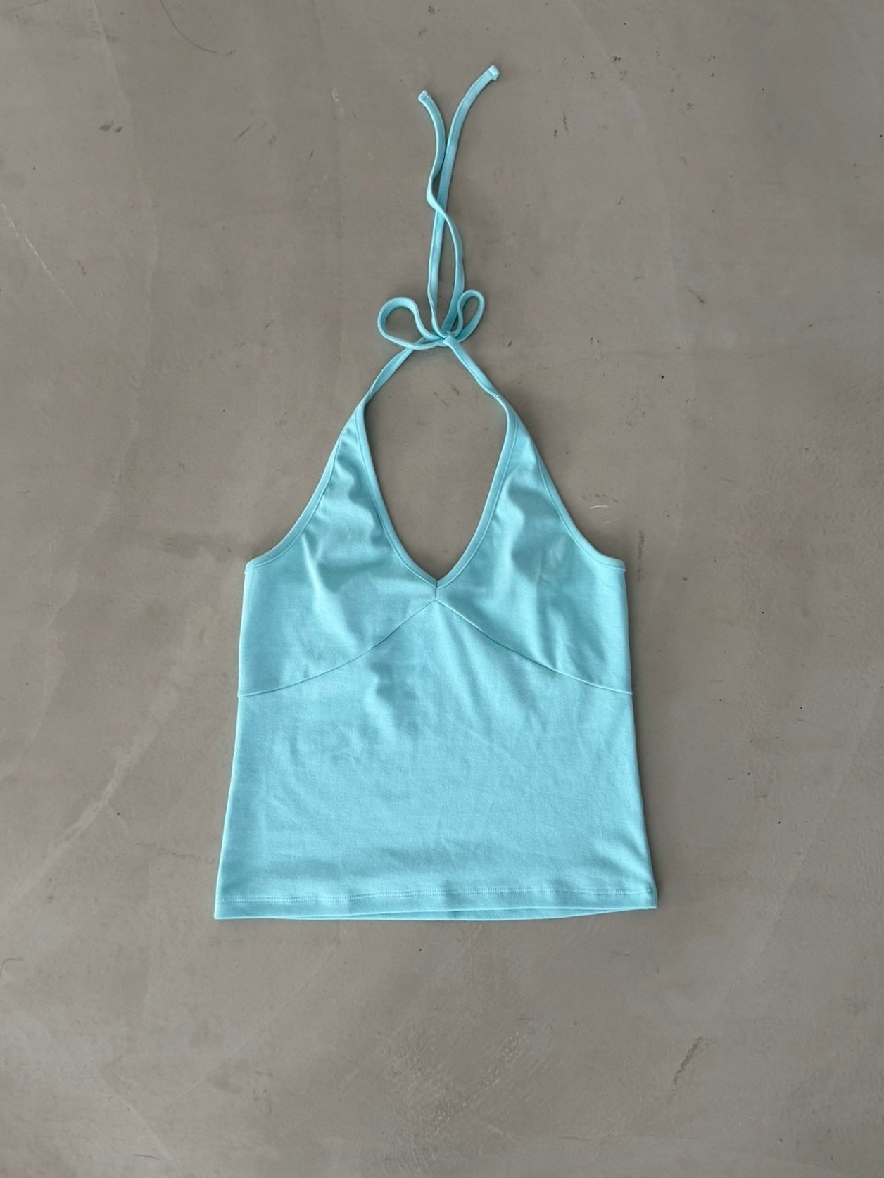 Brightly colored halter neck vest