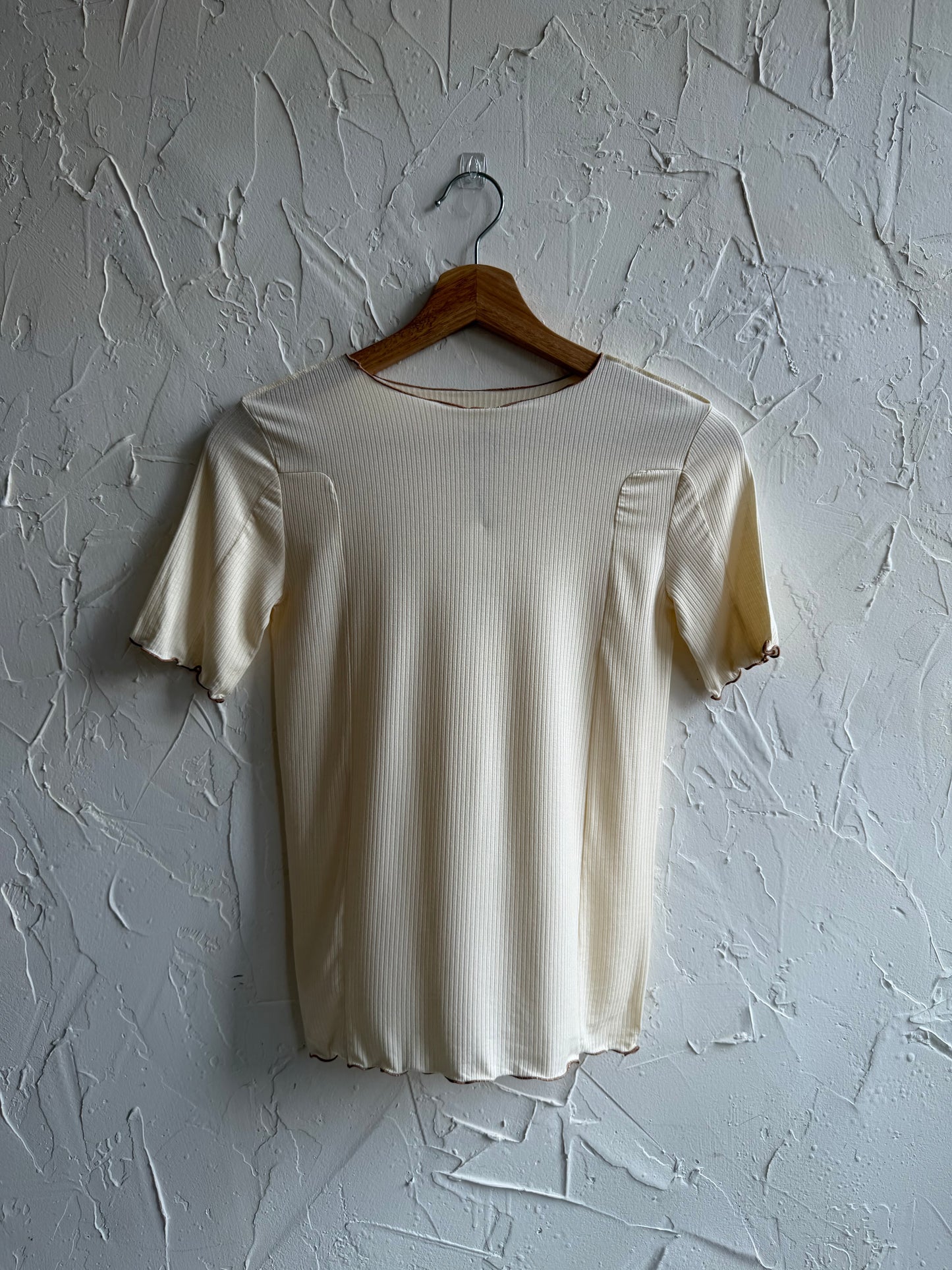 Skin-friendly striped top with piping