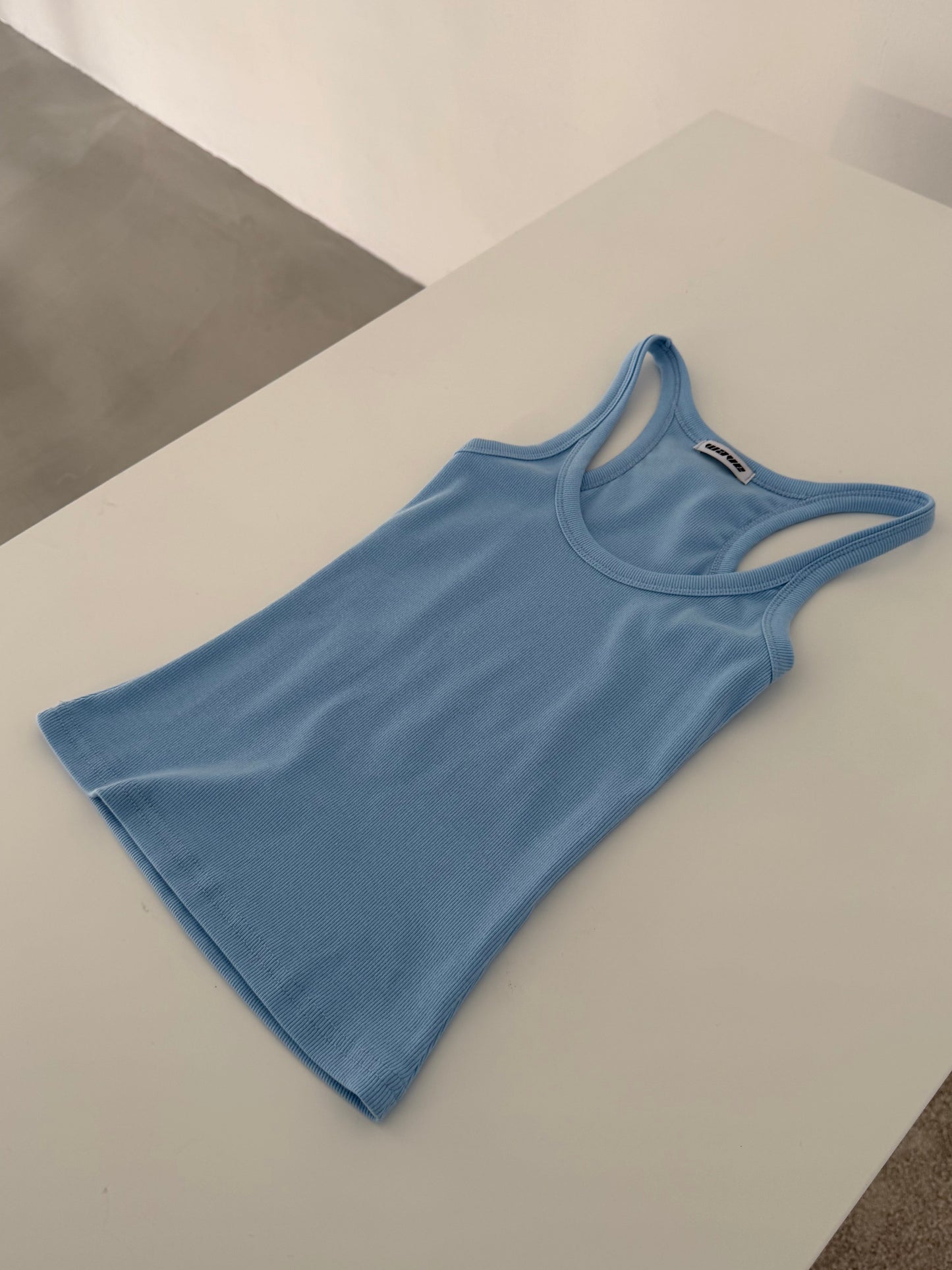 Brightly colored spaghetti strap tank top