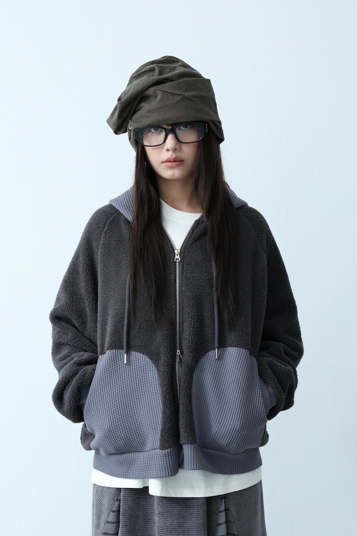 Hooded jacket with mixed materials