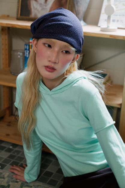 Rolled-up patchwork hooded top