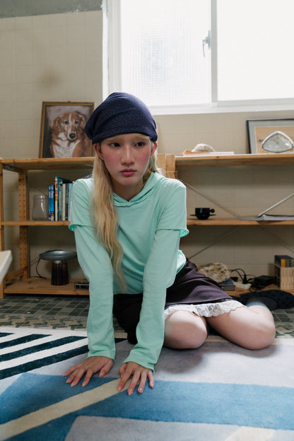 Rolled-up patchwork hooded top