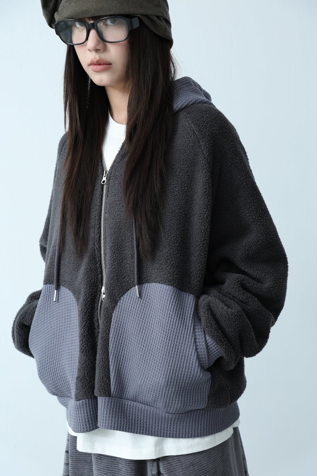 Hooded jacket with mixed materials