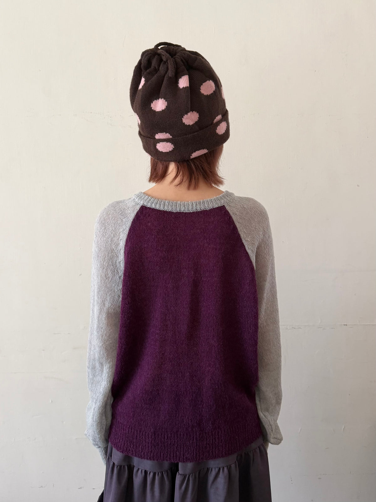 Henley collar knit raglan top
