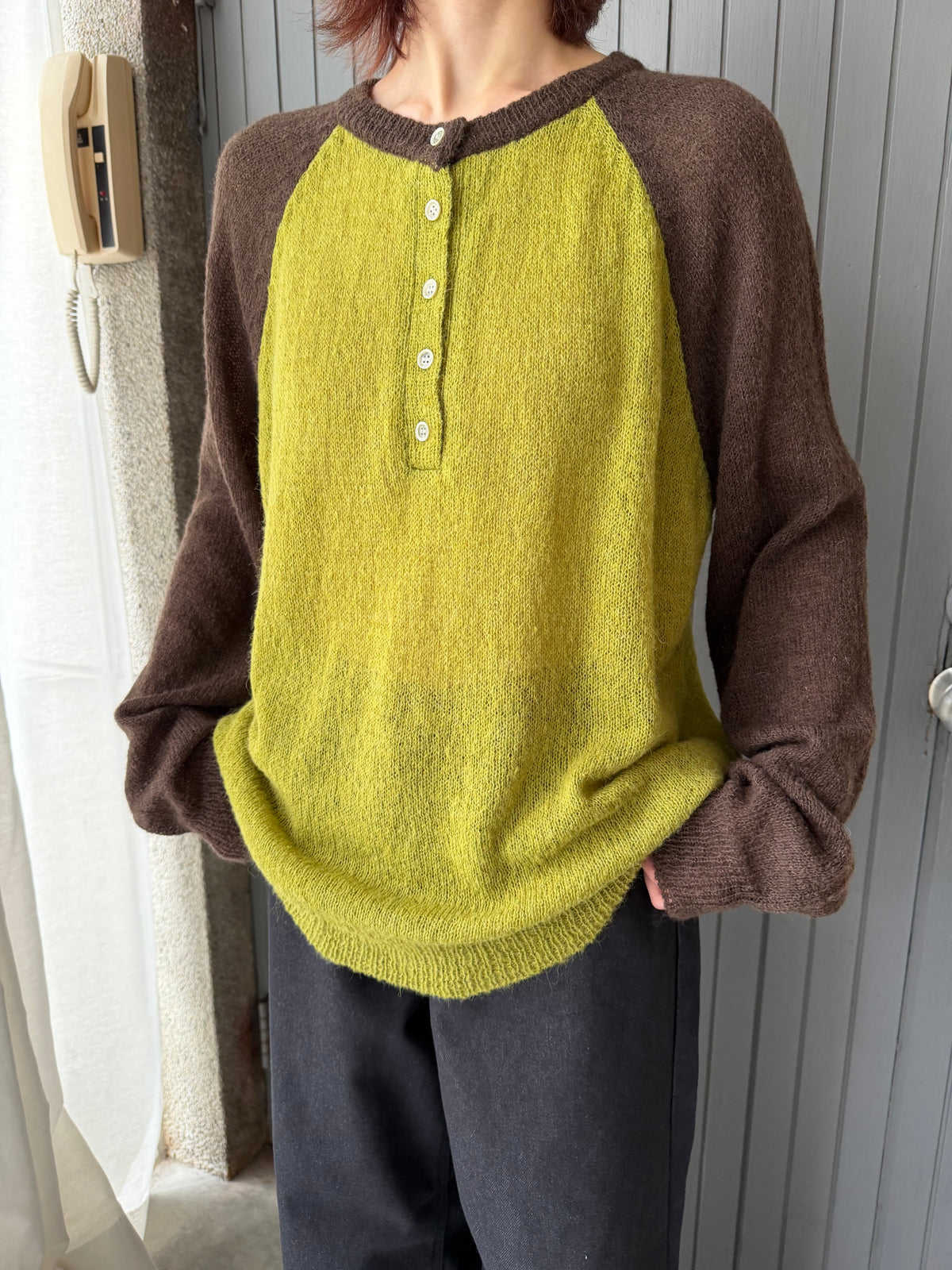 Henley collar knit raglan top
