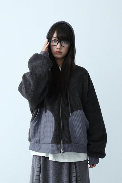 Hooded jacket with mixed materials