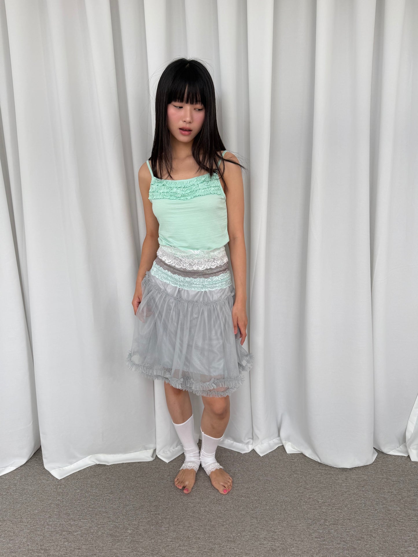Puffy lace-trimmed mini skirt