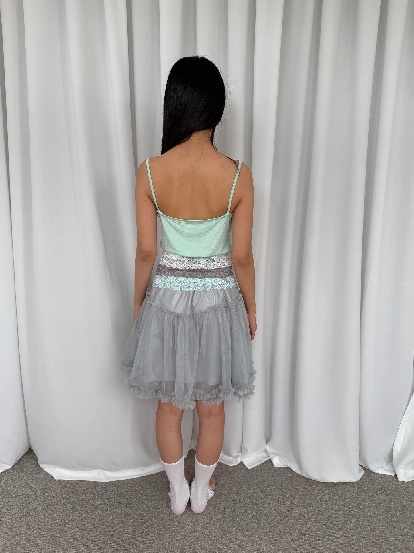 Puffy lace-trimmed mini skirt